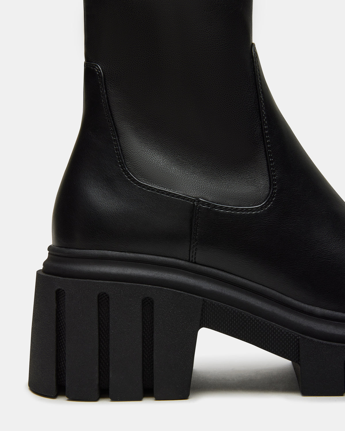 BOOMBA Black Lug Sole Ankle Boot | Women's Booties